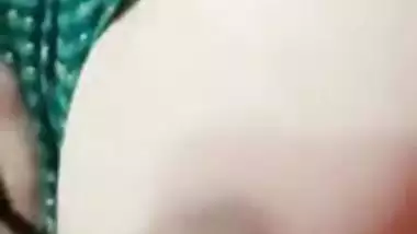 Stripchat girl Trisha playing with naked boobs