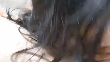 GF with smiling face gives blowjob to boyfriend