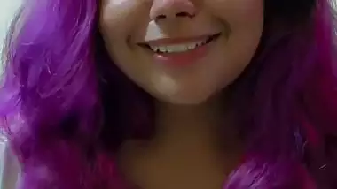 Purple head desi girl holding huge milk tankers