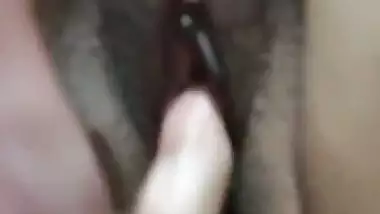 Brown haired cam girl boob pressing and pussy fingering
