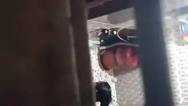 Neighbor aunty taking bath caught by voyeur